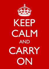 Slogan Keep Calm and Carry On shown on Red British War Poster with white lettering